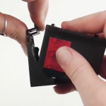 Removing clips and tabs off cartridges with in built print heads